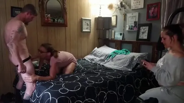 Real Amateur Threesome with One Girl Waiting Her Turn in Bed